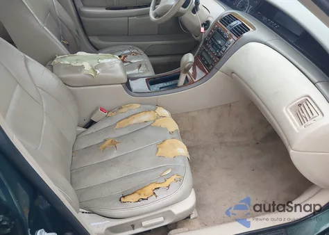 2000 Toyota Avalon Xls z USA, uszkodzony, nr VIN 4T1BF28B6YU036865